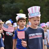 Madison Academy Photo #4 - Our Kindergarten students honor the fallen of 9/11 during the I Love America parade.