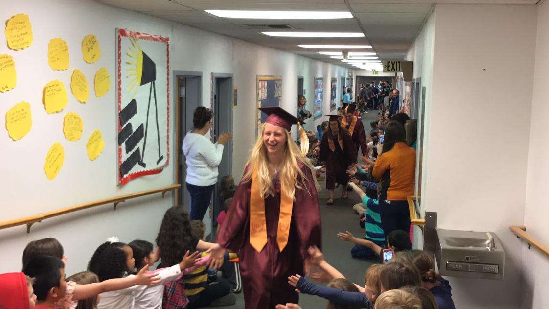 Grace Christian School Photo - Senior Walk - on the day of graduation our seniors walk the hall one final time!