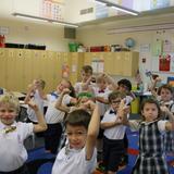 All Saints' Episcopal Day School Photo #4 - The first grade students flex their muscles on "Bow Tie Day"