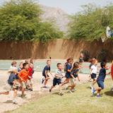 Pusch Ridge Christian Academy Grammar Photo #6 - We make sure kids have the chance to be kids! Here, students have a special treat at recess. .