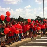 Ridgefield Christian School Photo - Students release balloons with their favorite book inside as the kick-off for Accelerated Reading.
