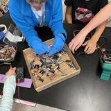 Spring Hill School Photo #8 - Students established a battery recycling collection station that started with first making sure the batteries have no more juice.