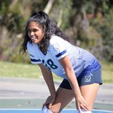 Berkeley Hall School Photo #12 - 8th grader on Junior High Girls Volleyball Team prepares to receive a serve.