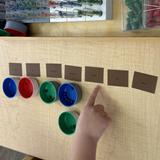 Children's Montessori School Photo #4 - See how changing the adjective changes the meaning - making it specific.