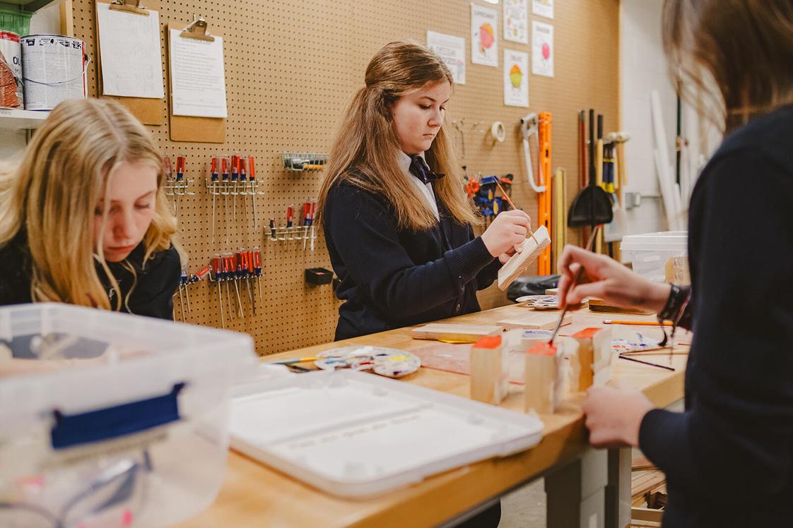 Our Lady Of Grace Catholic School Photo - Middle school students collaborate on STEM projects in the school's woodshop.