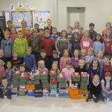 Newton Christian School Photo #3 - Newton Christian students pose with the boxes for Operation Christmas Child.