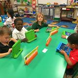 Xavier Catholic School Photo #1 - Kindergarten students using iPads during class.