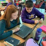 The Frankfort Christian Academy Photo #5 - MS students work together in Bible class on a project.