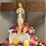 Carencro Catholic School Photo #2 - Students brought flowers to honor Mary on the Feast of the Assumption.