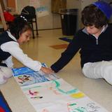 Jewish Community Day School Photo #3 - Kindergarten using art to understand literature.