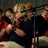 The Kings Christian Academy Photo #8 - Our elementary music program continues to grown and includes a Strings Club for interested lower and middle school students.
