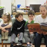 St. Peter's School Photo #4 - 6th grade students reading to their Pre-K buddies