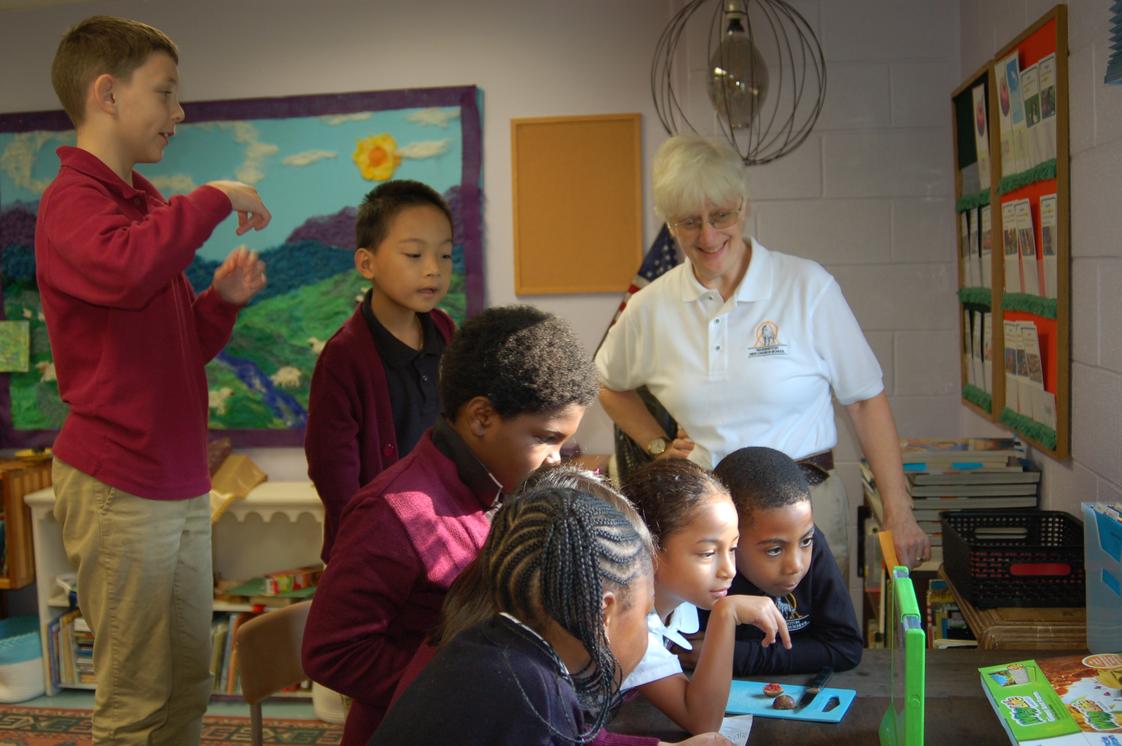 Washington New Church School Photo #1 - First and Second grades populate their new ant farm.