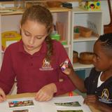 Washington New Church School Photo #4 - Jr. Kindergarten student with a 4th grade "buddy".