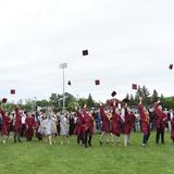 Bishop Stang High School Photo #3 - Immediately following the graduation ceremony, the Class of 2021 gathers for one final time on the front field to celebrate their amazing accomplishments!