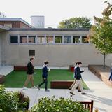 Catholic Memorial Photo #11 - Students walk across Hegarty Plaza to welcome guests during Open House.