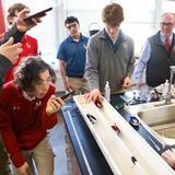 Catholic Memorial Photo #5 - A chemistry class illustrates the manner by which Knight Based Learning is a hands-on approach that engages boys to think and use their hands.
