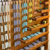 King's Wood Montessori School Photo #5 - Montessori math materials in action: These colorful bead chains and cubes help students visually and physically explore foundational concepts like counting, place value, and multiplication in a concrete, hands-on way