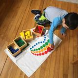 Woodside Montessori Academy Photo - Sensorial Montessori materials allow children opportunities for developing the senses, concentration, executive function skills and problem solving.