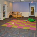 KinderCare Learning Center at Cochituate Road Photo #10 - Infant/Toddler Gym used for gross-motor activities daily such as yoga, push toys, running and throwing balls!