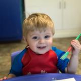 Growing Years Learning Center Photo - One of our toddlers enjoying art!