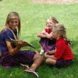 Immaculate Heart Of Mary School Photo #4 - As prayer partners older students mentor younger ones.