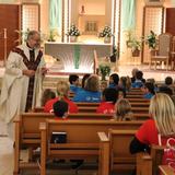 St. Regis Catholic School Photo #3 - We celebrate Mass together weekly. We begin each day with Prayer. Children attend Religion class daily and prepare for receiving their sacraments. Adoration, Reconciliation, Living Rosary, and more opportunities for prayer and learning and living our Catholic faith are offered.