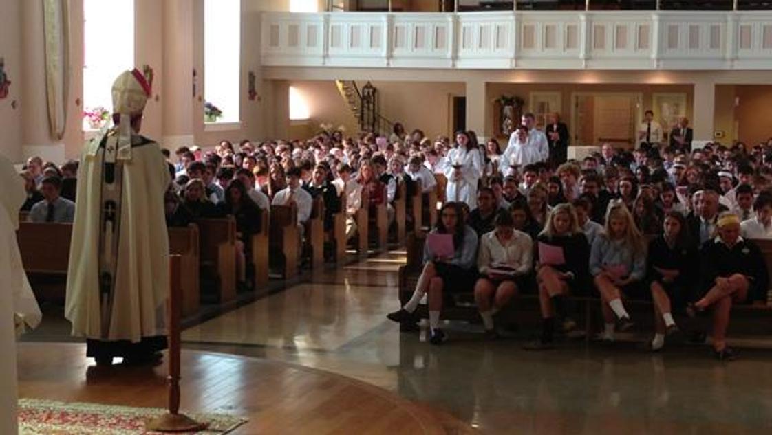 St. Mary Catholic Central High School Photo - Living Faith- Students sharing mass with Archbishop Vigneron.