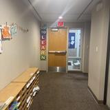 Discovery Corner Academy Photo #7 - Hallway and Mailboxes: Our hallway is bright and welcoming and connects our classrooms and learning areas throughout DCA. Each child has a personal mailbox where important notes artwork and special messages can be shared with families.
