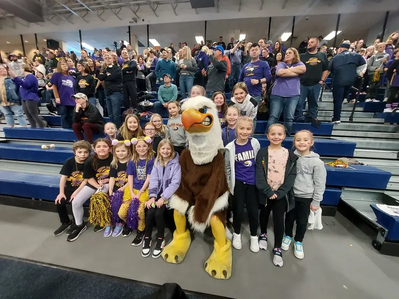 Sacred Heart School Photo #2 - Eugene the Eagle with Sacred Heart School elementary students at the Boys Basketball State Tournament