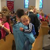 St. John Lutheran School Photo #4 - Older students help to sit with the childcare during chapel services.