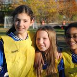 Jewish Community Day School Photo #3 - Three members of the JCDS Girls Soccer teams take a break to smile for the camera.