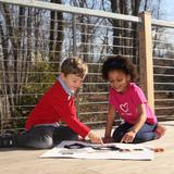 Far Brook School Photo #7 - Our classrooms open directly to the outdoors, enabling the students to experience the natural world in all seasons and weather. Often, children are found having classes in one of our many outdoor spaces.