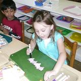 New World Montessori School Photo #6 - Various art lessons are always available for the children to choose.