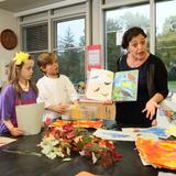 The Rumson Country Day School Photo #1 - Lower School students during class in the crafts studio.