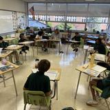 The Wardlaw+Hartridge School Photo #12 - Middle School students collaborate with their teacher.