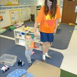 Springdale Road KinderCare Photo #5 - Ms. Lori loves seeing her children reach all of their milestones! Here she is helping Vailen learn to walk.