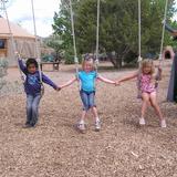 Little Earth School Photo #7 - Friends Swinging