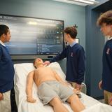 Archbishop Stepinac High School Photo #10 - Hands on career learning with adjunct professors from medical professions (adult patient human simulator)