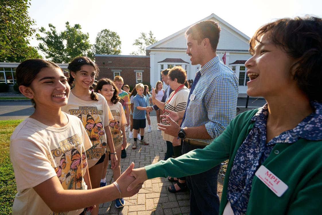 Manlius Pebble Hill School Photo - The opening day Handshake Ceremony is a tradition that dates back generations, with the entire student body along with faculty and staff to welcome each other into a new academic year. Handshakes, hugs, high fives, fist bumps, waves, and rock-paper-scissors are all forms of greetings.