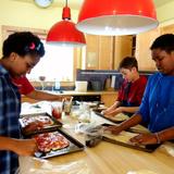 North Country School Photo #9 - Students cooking dinner together on homenight