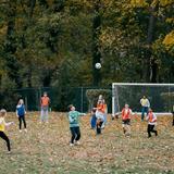 Riverdale Country School Photo #4 - Lower School students take PE outside, building teamwork, coordination, and confidence through sports and active play.