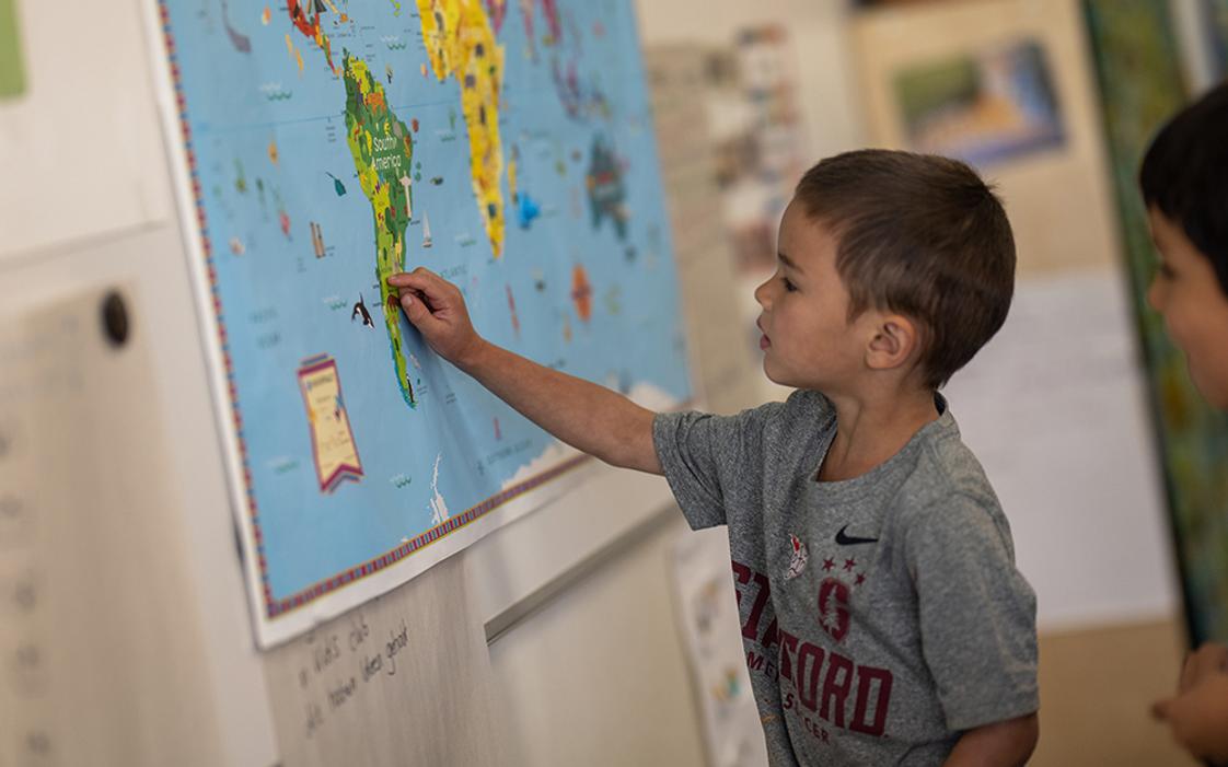 Silicon Valley International School Photo #1 - Early Years student working at a map