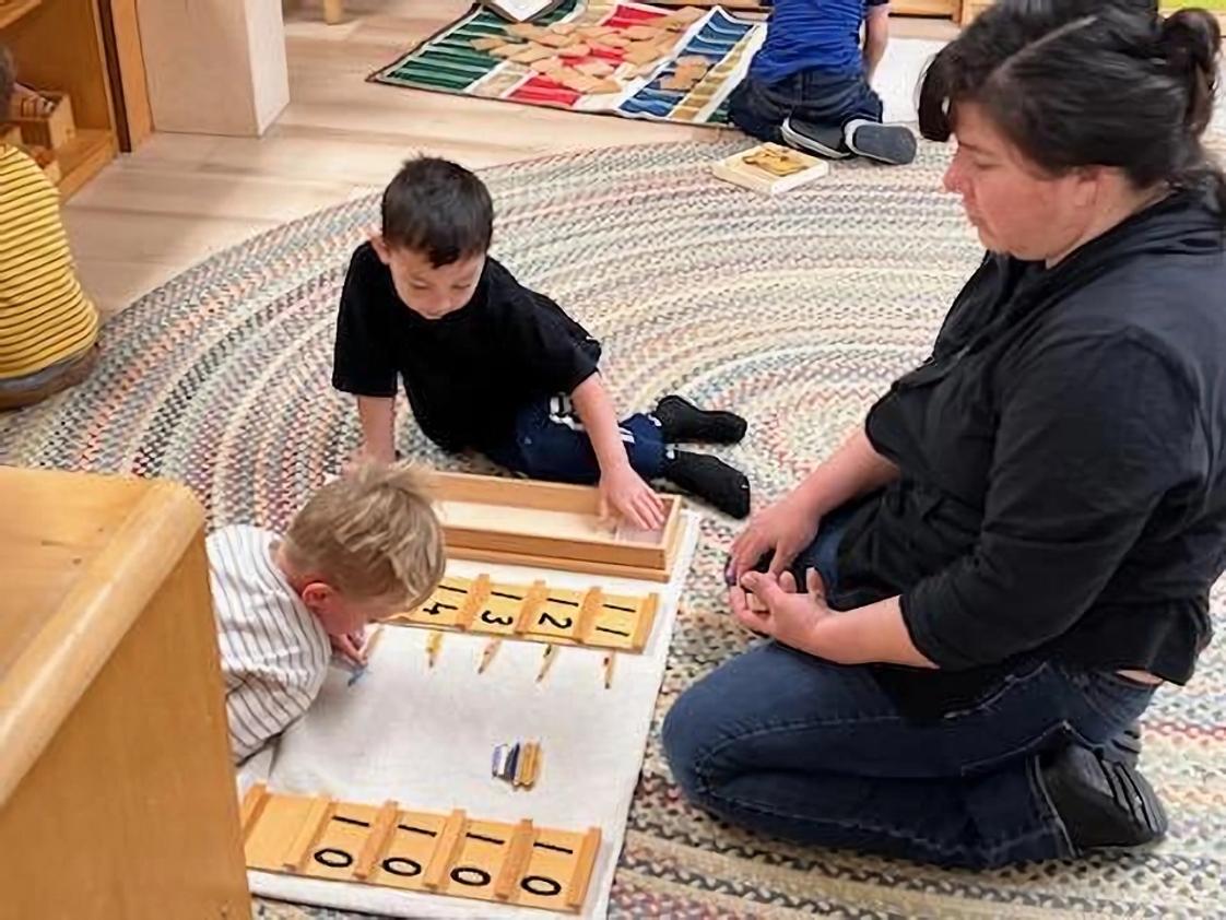 Santa Rosa Montessori Photo #1 - Hands-on exploration of teen numbers-connecting symbols to quantities through learning by doing, building a strong foundation in place value and number sense.
