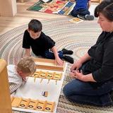 Santa Rosa Montessori Photo #3 - Hands-on exploration of teen numbers-connecting symbols to quantities through learning by doing, building a strong foundation in place value and number sense.