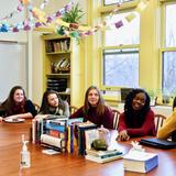 Buffalo Seminary Photo #5 - Our humanities classrooms feature Harkness tables where no student goes unnoticed and seminar style learning fosters critical thought and discussion.