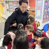 Transfiguration School Photo #10 - Hugs for Father Roger!