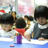 Transfiguration School Photo #2 - Pre-K students drawing in their class.