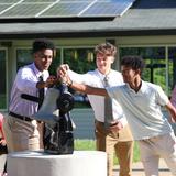 Carolina Day School Photo - Seniors and Juniors ring the bell before the Upper School Awards Ceremony