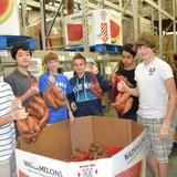 Fayetteville Academy Photo #5 - On Volunteer Day, a group of Fayetteville Academu seventh graders helped bag sweet potatoes at a local food bank.